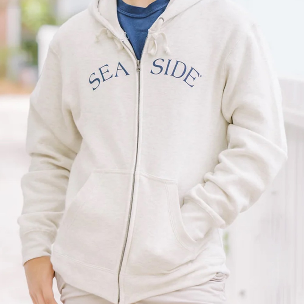 Seaside Zip Up Hoodie in color Oat with navy blue letters